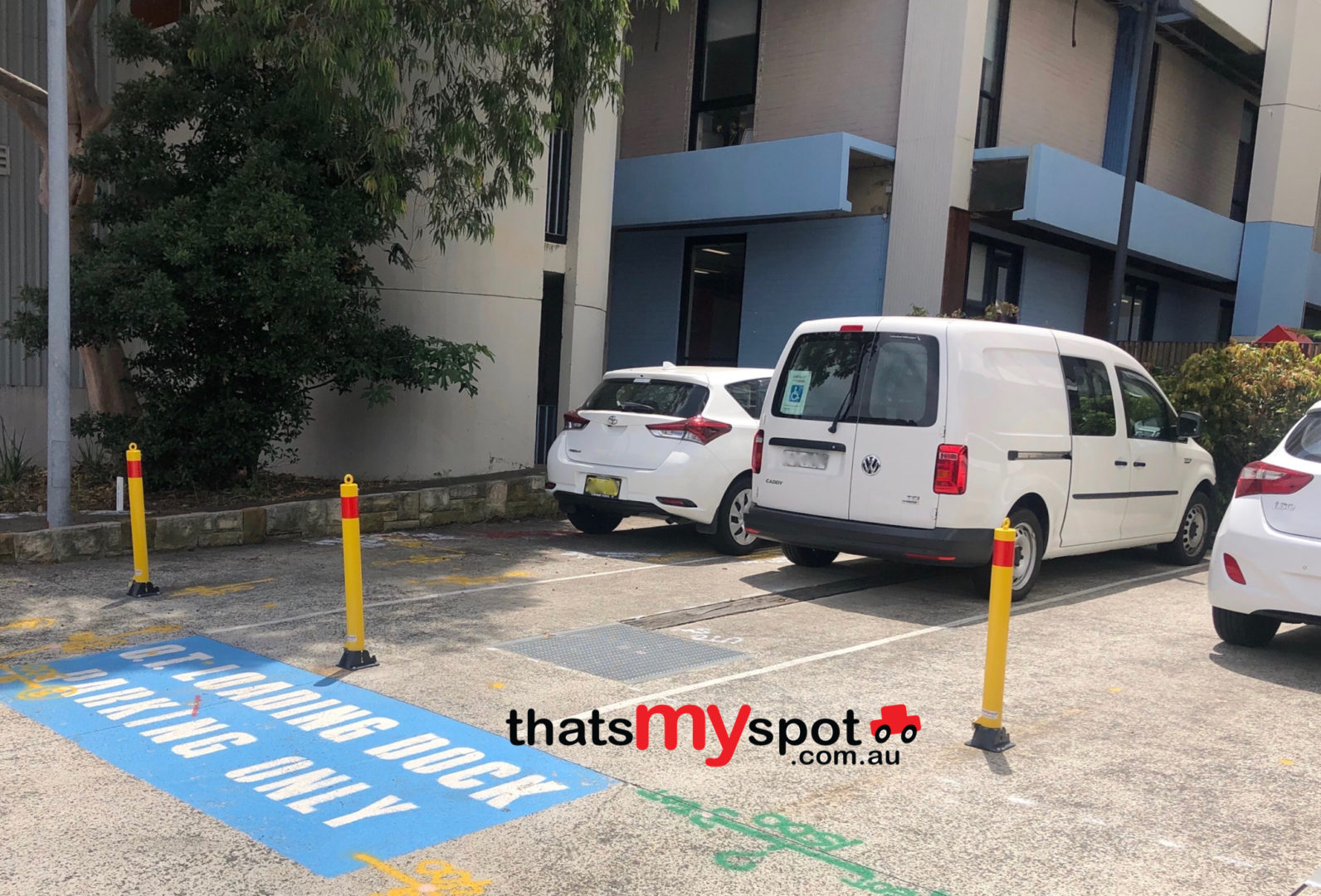 manual-folding-parking-bollard-TMS-B04-and-TMS-B06-installed-outdoors